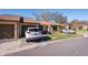 Front view of the house with cars parked at 2101 Sunset Point Rd # 2304, Clearwater, FL 33765