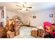 Home office with a desk, chair, and plenty of storage at 2101 Sunset Point Rd # 2304, Clearwater, FL 33765