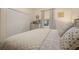 Bedroom with a king-size bed, neutral tones, and ample closet space at 6720 The Masters Ave, Lakewood Ranch, FL 34202