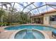 Enjoy this large screened pool and spa with plenty of surrounding patio space at 6720 The Masters Ave, Lakewood Ranch, FL 34202