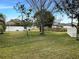 Grass backyard with a white vinyl fence at 562 Vista Ridge Dr, Ruskin, FL 33570