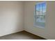 Small bedroom with carpeted floors and window blinds at 562 Vista Ridge Dr, Ruskin, FL 33570