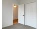 Bright bedroom with carpet, large closet, and access to another room at 562 Vista Ridge Dr, Ruskin, FL 33570