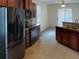 Kitchen with stainless steel appliances and wood cabinets at 562 Vista Ridge Dr, Ruskin, FL 33570