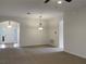 Spacious living room with high ceilings and neutral color palette at 562 Vista Ridge Dr, Ruskin, FL 33570
