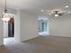Open concept living room with a view into the kitchen area at 562 Vista Ridge Dr, Ruskin, FL 33570