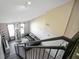 Loft overlooking living room with black railing at 4221 W Spruce St # 1407, Tampa, FL 33607