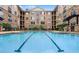 Resort-style pool with building in background at 4221 W Spruce St # 1407, Tampa, FL 33607