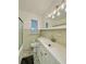 Modern bathroom with updated vanity and fixtures at 732 Riverside Dr, Tarpon Springs, FL 34689