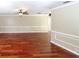 Spacious living room featuring hardwood floors and neutral walls at 3534 Player Dr, New Port Richey, FL 34655