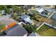 Aerial view highlighting home, backyard, and neighboring buildings at 510 S Disston Ave, Tarpon Springs, FL 34689