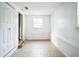 Empty room in basement featuring tiled floors and white walls at 2216 52Nd N Ave, St Petersburg, FL 33714