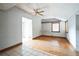 Simple bedroom with hardwood floors and a ceiling fan at 2216 52Nd N Ave, St Petersburg, FL 33714