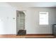 Open kitchen pantry with white shelving and small window at 2216 52Nd N Ave, St Petersburg, FL 33714