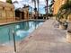 Inviting swimming pool with lounge chairs and a relaxing atmosphere at 750 N Tamiami Trl # 814, Sarasota, FL 34236