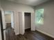 Bedroom with double-door closet and a window at 1401 Newton St, Port Charlotte, FL 33952