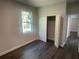 Bedroom with double-door closet and access to another room at 1401 Newton St, Port Charlotte, FL 33952