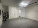 Clean and spacious garage with epoxy flooring and extra storage at 1401 Newton St, Port Charlotte, FL 33952