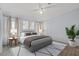 Main bedroom with wood-look floors and neutral decor at 3105 Beaver Creek Dr, Wesley Chapel, FL 33543