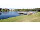 Peaceful lakefront community with a pier and benches at 3105 Beaver Creek Dr, Wesley Chapel, FL 33543