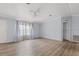 Living room featuring light walls and vinyl flooring at 3105 Beaver Creek Dr, Wesley Chapel, FL 33543