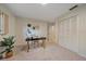 Spacious bedroom with built-in closet and desk at 3770 Torrey Pines Blvd, Sarasota, FL 34238