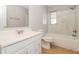 Clean bathroom with bathtub, vanity, and window at 1370 Leona Dr, Largo, FL 33770