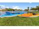 Two kayaks on the grassy bank of a canal at 2917 Palm Dr, Punta Gorda, FL 33950