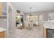 Kitchen with view of dining room and pool at 2917 Palm Dr, Punta Gorda, FL 33950