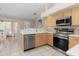 Kitchen boasts stainless steel appliances and ample counter space at 2917 Palm Dr, Punta Gorda, FL 33950