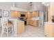 Spacious kitchen with stainless steel appliances and light wood cabinets at 2917 Palm Dr, Punta Gorda, FL 33950