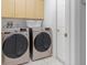 Laundry room with modern washer and dryer at 2917 Palm Dr, Punta Gorda, FL 33950
