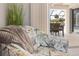 Comfortable chair with coastal decor, offering a relaxing view of the pool at 2917 Palm Dr, Punta Gorda, FL 33950