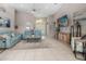 Open concept living room with comfortable seating and a view of the pool area at 2917 Palm Dr, Punta Gorda, FL 33950
