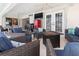 Spacious covered patio with comfortable seating and fire pit at 2917 Palm Dr, Punta Gorda, FL 33950