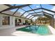 Inviting pool with covered patio and expansive backyard at 2917 Palm Dr, Punta Gorda, FL 33950