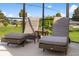 Relaxing screened lanai with lounge chairs and view of backyard at 2917 Palm Dr, Punta Gorda, FL 33950