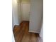 Light and airy entryway with wood-look flooring at 4215 Pecos Dr, New Port Richey, FL 34653