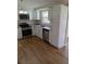 Modern kitchen featuring stainless steel appliances and granite countertops at 4215 Pecos Dr, New Port Richey, FL 34653
