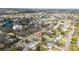 Wide aerial view showing home and neighborhood at 4401 Shore Acres Ne Blvd, St Petersburg, FL 33703