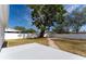 Landscaped backyard with patio and brick path at 4401 Shore Acres Ne Blvd, St Petersburg, FL 33703