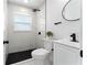 Modern bathroom with walk-in shower and white vanity at 4401 Shore Acres Ne Blvd, St Petersburg, FL 33703