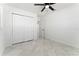 Bedroom with double doors closet and tile floors at 4401 Shore Acres Ne Blvd, St Petersburg, FL 33703