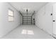 Clean and spacious garage with painted floor at 4401 Shore Acres Ne Blvd, St Petersburg, FL 33703