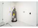Garage with water heater and laundry hookups at 4401 Shore Acres Ne Blvd, St Petersburg, FL 33703