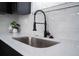 Modern kitchen sink with black faucet at 4401 Shore Acres Ne Blvd, St Petersburg, FL 33703