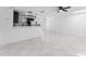 Open concept kitchen with island and modern lighting at 4401 Shore Acres Ne Blvd, St Petersburg, FL 33703