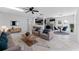 Open concept living space with modern furnishings and a kitchen at 4401 Shore Acres Ne Blvd, St Petersburg, FL 33703