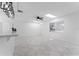 Open living area with tile floors and skylight at 4401 Shore Acres Ne Blvd, St Petersburg, FL 33703