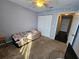 Bedroom with a twin bed and a ceiling fan at 2022 Peaceful Palm St, Ruskin, FL 33570